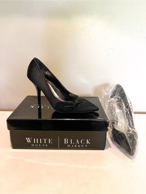 White House Black Market "Brandy" black satin pumps with side bow